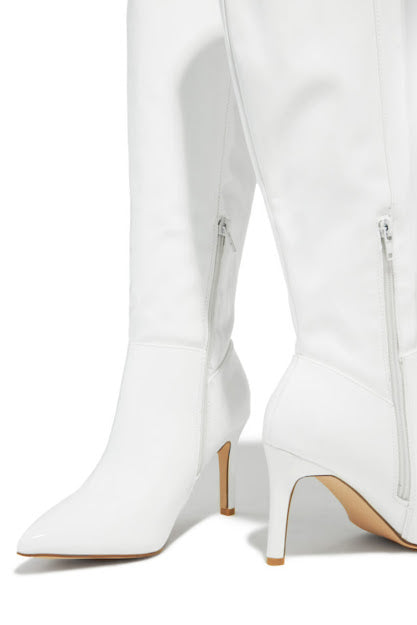 BELOW JNEE OVER BOOTS